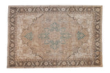 Distressed Vintage Turkish Heriz design carpet with geometric medallion, softened neutrals, dusty teal accents.