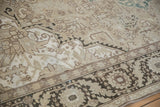 Distressed Turkish Heriz rug: geometric motifs, border, mostly even wear, ivory and coffee brown.