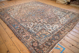 High angle view of a vintage Mehrivan carpet's concentric shield-like medallions.