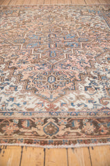 A low perspective shot across the short wool pile of a vintage Mehrivan carpet.