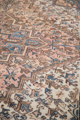 Short pile and stepped geometric patterns in dusty blush, sapphire blue, and chocolate brown.