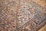 The even, short pile and hand-knotted texture of a vintage Mehrivan carpet.