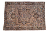 Distressed Mehrivan carpet with central medallion, faded beige, blue, and rose patterns. 7'9