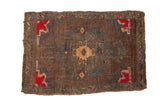 Vintage distressed Turkish Kars rug with gold medallion, red spandrels, and bronze abrashed field.