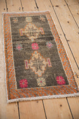 Textural vintage Kars rug with abrash, floral elements, and serrated tangerine border.