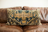 Oversize Turkish Rug Pillow, late 19th century fragment with navy and gold geometric medallion.