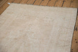 The reverse corner of a vintage Oushak runner with a securely machine-bound edge.