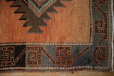 Vintage Distressed Kurd Runner: geometric border in terracotta, charcoal, and textured fringe.
