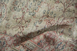 Evenly worn low pile and hand-knotted texture of a distressed vintage Sparta carpet.
