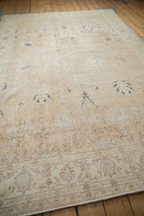 Distressed Turkish Sparta carpet detail, with exposed foundation and worn floral patterns.