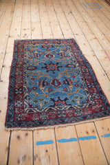 Angled perspective view of the vintage Persian Bibikabad rug, showing its plush pile and full design.