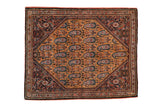 A fine vintage Sarouk square rug with a saffron field of repeating blue paisley boteh motifs.