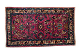 Vintage Lilihan rug with unusual magenta field, allover floral pattern, and plush hand-knotted pile.