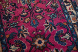 Plush pile vintage Lilihan rug with magenta field and detailed floral motifs.