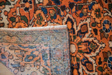 Vintage Hamadan rug: hand-knotted pile texture, visible woven foundation, and side selvage.