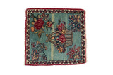 Antique Kerman square rug with a pictorial floral basket on a powder blue field with red and rose accents.