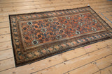 Vintage Malayer rug's intricate, dark blue and brown side borders with secured selvage.