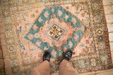 Central quatrefoil medallion and stepped spandrels on a vintage Anatolian rug.