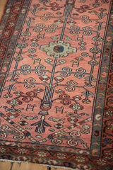 Dusty raspberry Persian Mehriban rug showing tree-of-life design and meandering vine border.