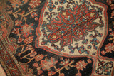 Intricate madder root red, dusty blue blossoms and geometric vinery on navy and beige.