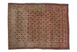 Vintage Sarouk hand-knotted rug with staggered cypress and floral design in ivory, green, terracotta, blue.