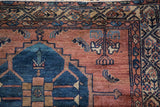 Madder root red field with geometric mahi mahi designs and Serbend border pattern.