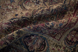 Worn, finely woven antique Kermanshah pile revealing foundation and aubergine, dusty gold arabesques.