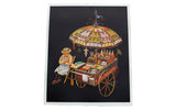 Vintage K Chin lithograph showing a colorful hot dog vendor's cart with an ornate umbrella.