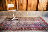 Tattered antique Caucasian rug, late 19th century, geometric design in vibrant red and blue, 3'5