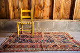 Worn antique Kazak Prayer rug, late 19th century, with geometric red and blue design, 3x5.
