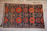 Antique Persian Senneh rug, dark rust and navy geometric pattern, visible low pile wear, 2x3.
