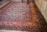 Antique Kerman rug corner, Safavid inspired border and worn aesthetic with fringe.