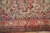 Antique Kerman border, Safavid-inspired design, cochineal red, dark blue, ivory, and worn aesthetic.