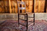 Antique Rush Seat Chair side detail, woven rush seat and dark wood patina.