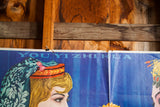 Vintage Chinese poster showing 'YOU YI ZHI HUA' text, woman's red hat, blue background, and creases.