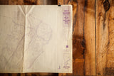 Vintage 1984 Greenburgh map displayed fully, highlighting its purple linework and paper creases.
