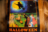 Vintage Halloween poster showing the full illustration and slight creases on the paper edges.