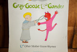 Playful gray-robed monk and pink-clad red devil from 'Gray Goose and Gander' book poster.