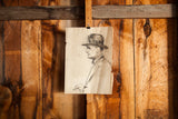 Vintage sketch of a contemplative gentleman in profile, wearing a hat and bow tie.