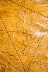 Close-up of the 1868 North America map showing triangulation lines and aged canvas.