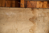 Reverse of antique 1868 North America map canvas with faded script and moisture marks.
