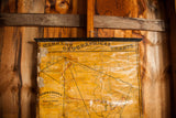 Aged pull-down map's upper section, 'Warren's Geographical Charts' title, with canvas wear.