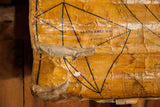 Antique 1868 North America map detail showing yellowed, peeling paper, exposed canvas, and dark lines.