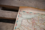 Aged paper corner of a vintage battle map showing the North Sea and Strait of Dover.