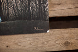 Artist H. Rousseau's signature on the dark lithograph showing a worn paper corner.