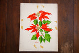 W. Homquist's red signature on the bottom of the poinsettia watercolor, with tape and pencil marks.