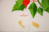 Red W. Holmquist signature with residual tape and pencil lines on the vintage poinsettia watercolor.