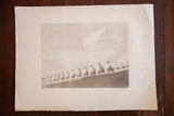 Artist D.R. Peretti Griva's signature on the lower right corner of the print, showing a paper fold.