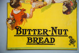Butter-Nut Bread logo, small illustrated figure, and printer's mark on the vintage poster.