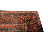 Antique Persian carpet border with madder red, teal, and saffron pomegranate design.
